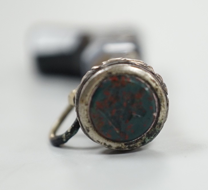 A 19th century white metal and bloodstone set novelty seal, modelled as a revolver, with banded agate handle, 43mm.
